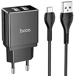 Сетевое зарядное устройство Hoco DC01 2.1a 2xUSB-A ports charger + micro USB cable black - фото Сетевое зарядное устройство Hoco DC01 2.1a 2xUSB-A ports charger + micro USB cable black
