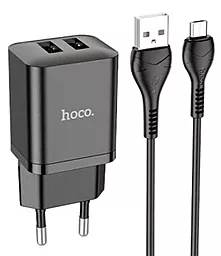 Сетевое зарядное устройство Hoco N25 2.1a 2xUSB-A ports charger + mirco USB cable black - фото Сетевое зарядное устройство Hoco N25 2.1a 2xUSB-A ports charger + mirco USB cable black