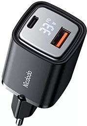 Сетевое зарядное устройство McDodo 33W PD/QC USB-C/USB-A black (CH-1701) - фото Сетевое зарядное устройство McDodo 33W PD/QC USB-C/USB-A black (CH-1701)